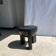 Black mango wood tripod side table with a semi-spherical top, height: 45 cm, diameter: 44 cm.