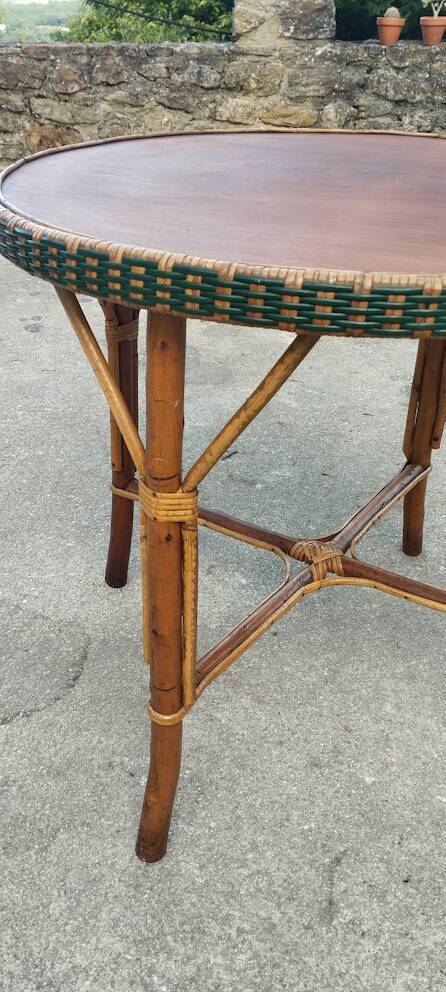 Round wood and rattan table