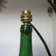 Rattan and glass "bottle" lamp from the 60s and 70s
