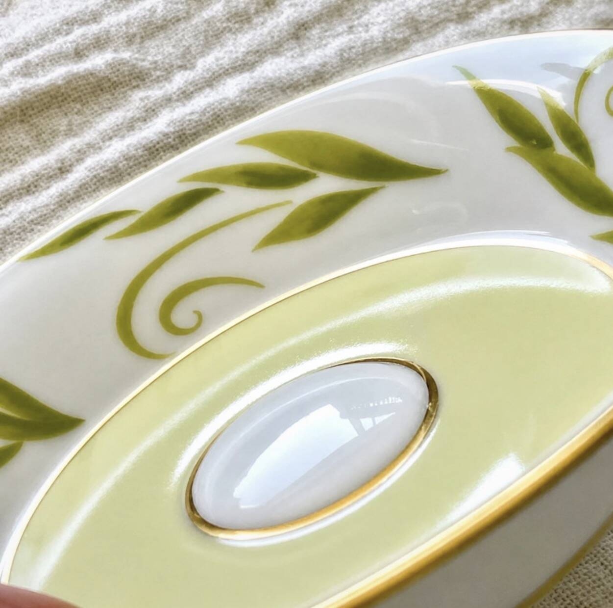 Bernardaud coffee/tea cup with saucer from the Frivole collection.