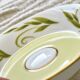 Bernardaud coffee/tea cup with saucer from the Frivole collection.