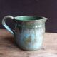 Handcrafted enameled terracotta pitcher signed