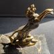 Pair of art deco marble and patinated regulated bookends