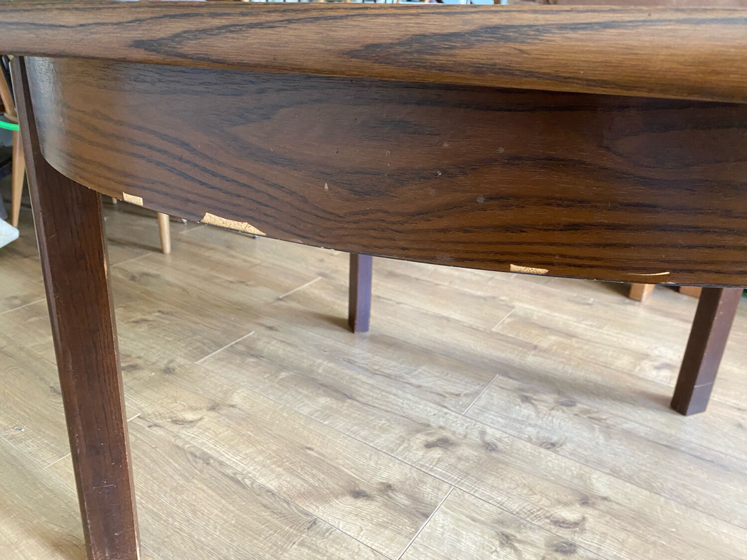 Table with an oak veneer and butterfly extension.