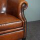 Leather club chair with black piping