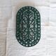 Vintage dark green cast iron oval trivet - Openwork design