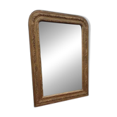 19th-century fireplace mirror in gilded wood and stucco.