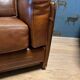 Ensemble de deux fauteuils en cuir de buffle.