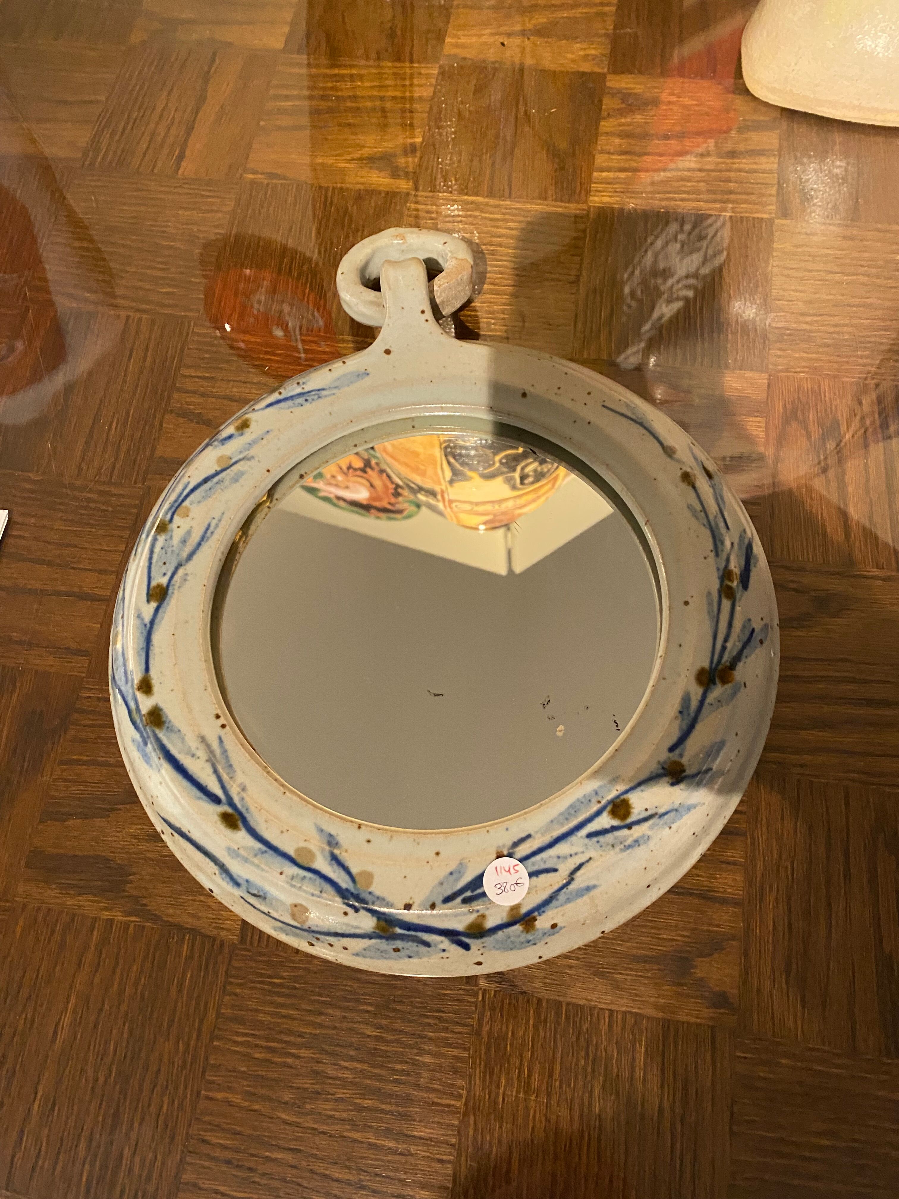 Round ceramic mirror 26x36cm