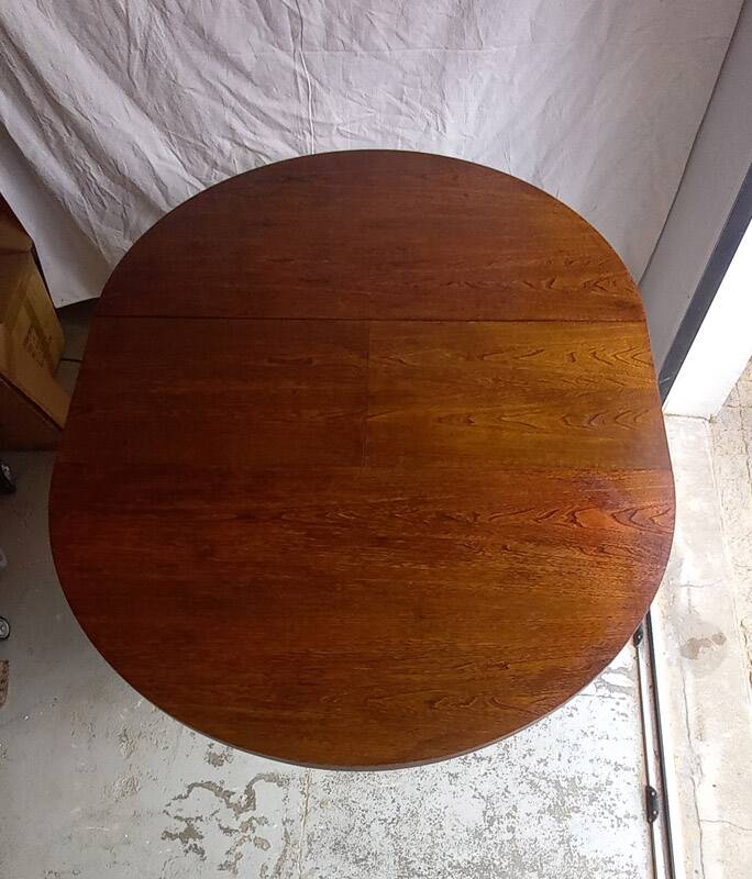Vintage round extendable wooden table.