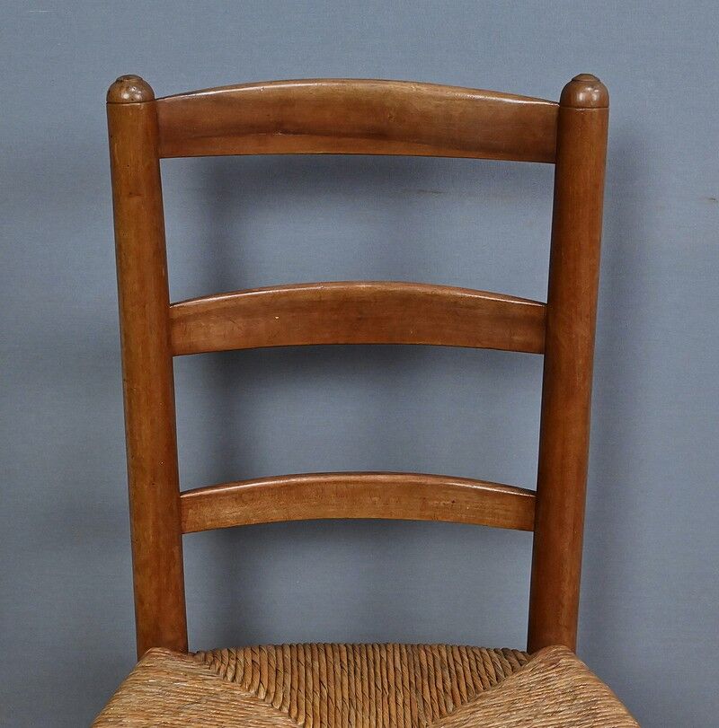 Set of 4 rush-seated chairs in cherry wood – late 19th century