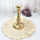 Gilded copper push candle holder