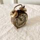 Small alarm clock old vintage watch in copper brass