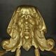 Pair of wall sconces with grotesque heads in 19th-century Renaissance style - bronze