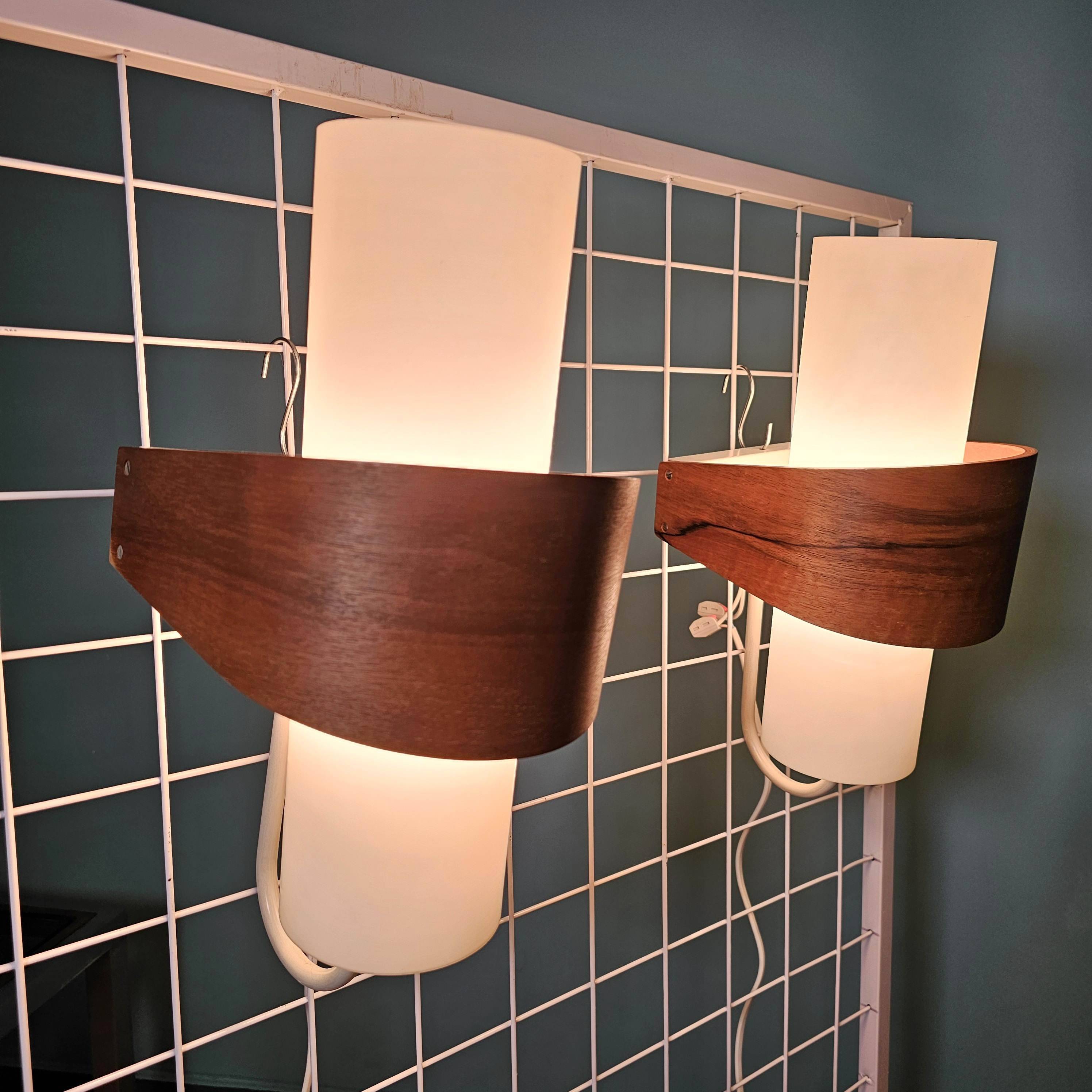 Louis kalff (1897-1976) for philips, pair of nx40 wall lights in wood, opaline glass, and lacquered metal,