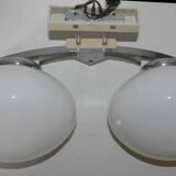 Pair of 60s wall lights in metal and opaline