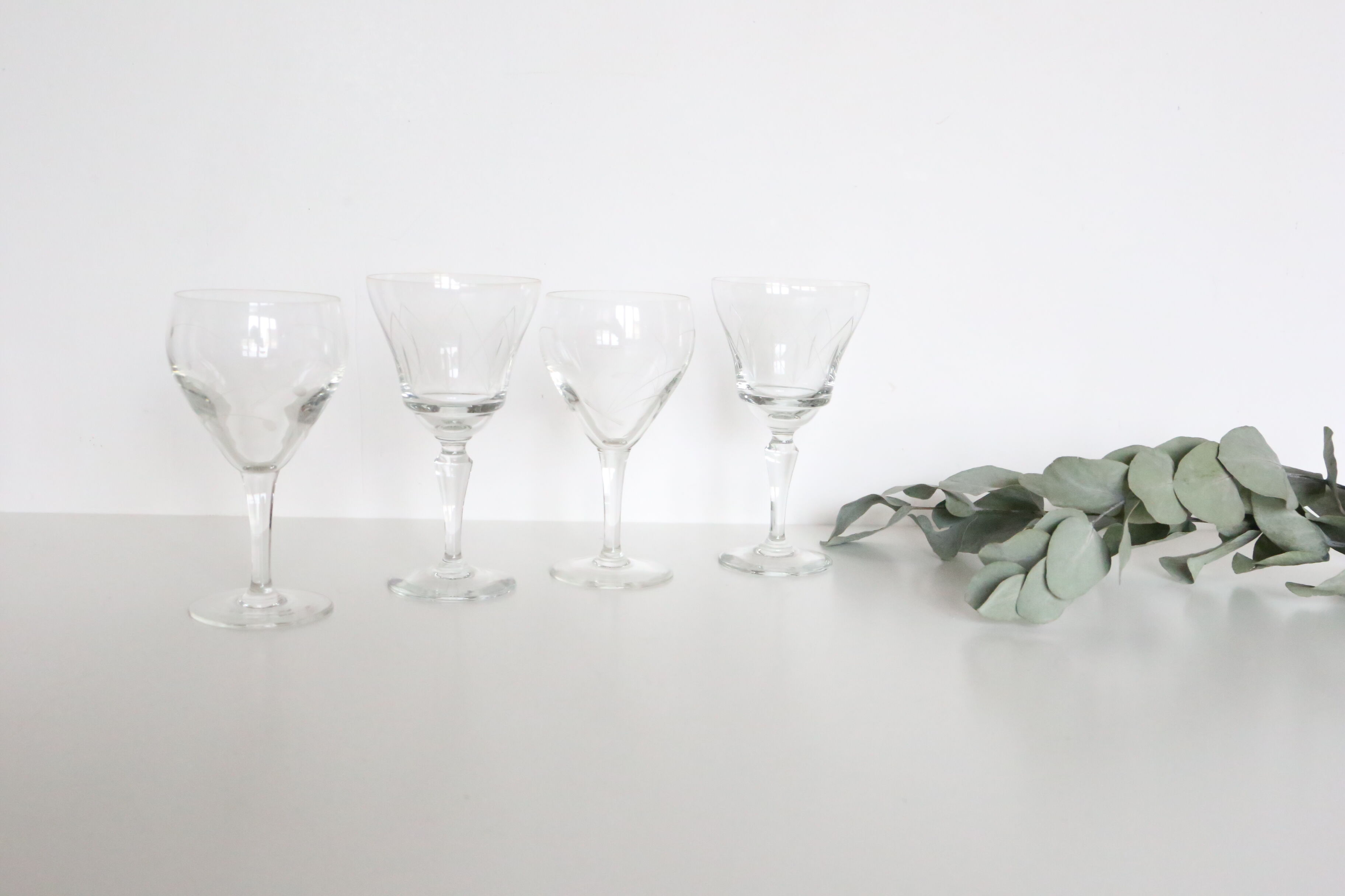 Set of 4 mismatched, crystal wine glasses