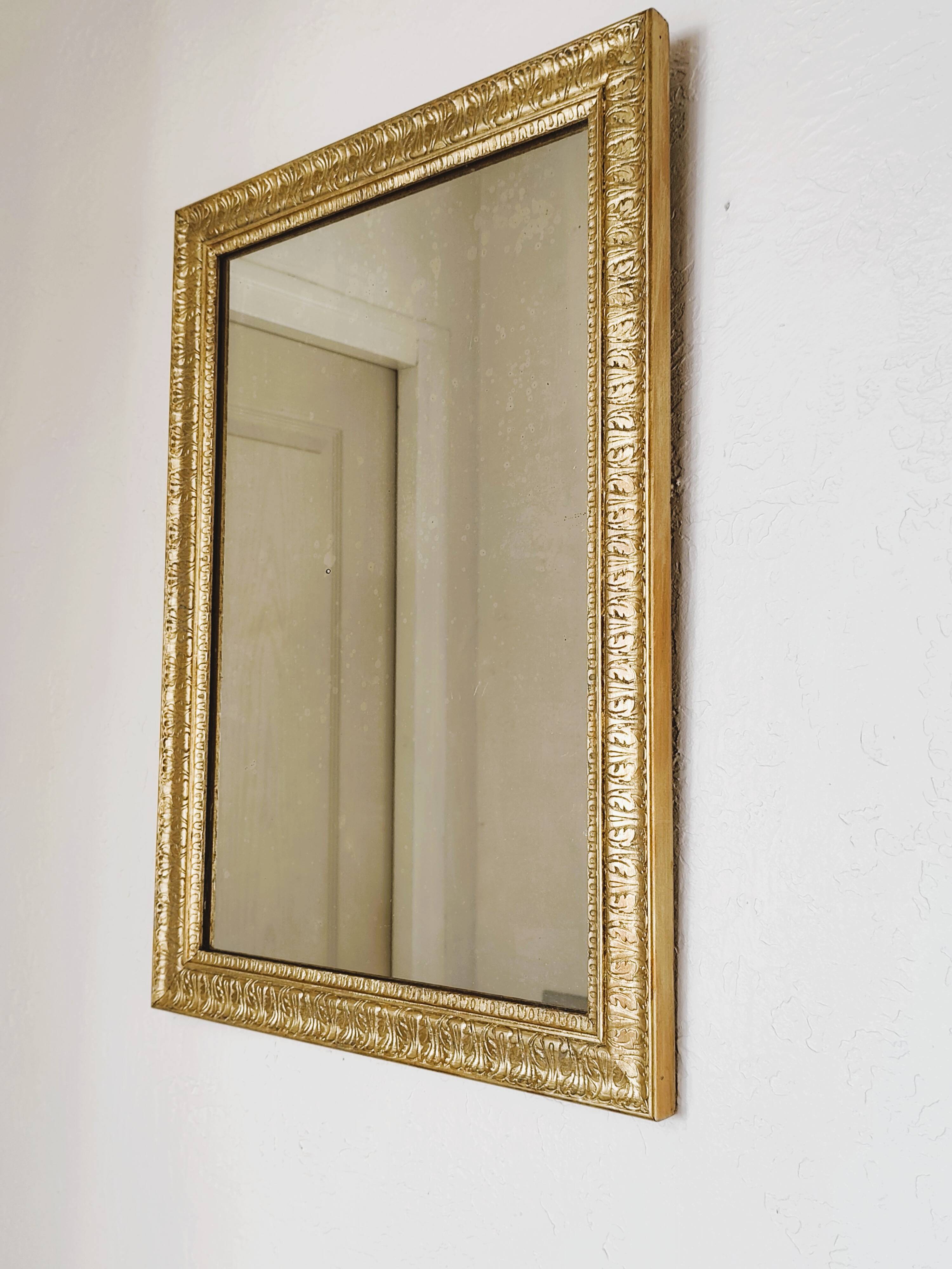 Antique gilded wooden rectangular mirror