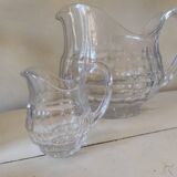 2 antique glass pitchers