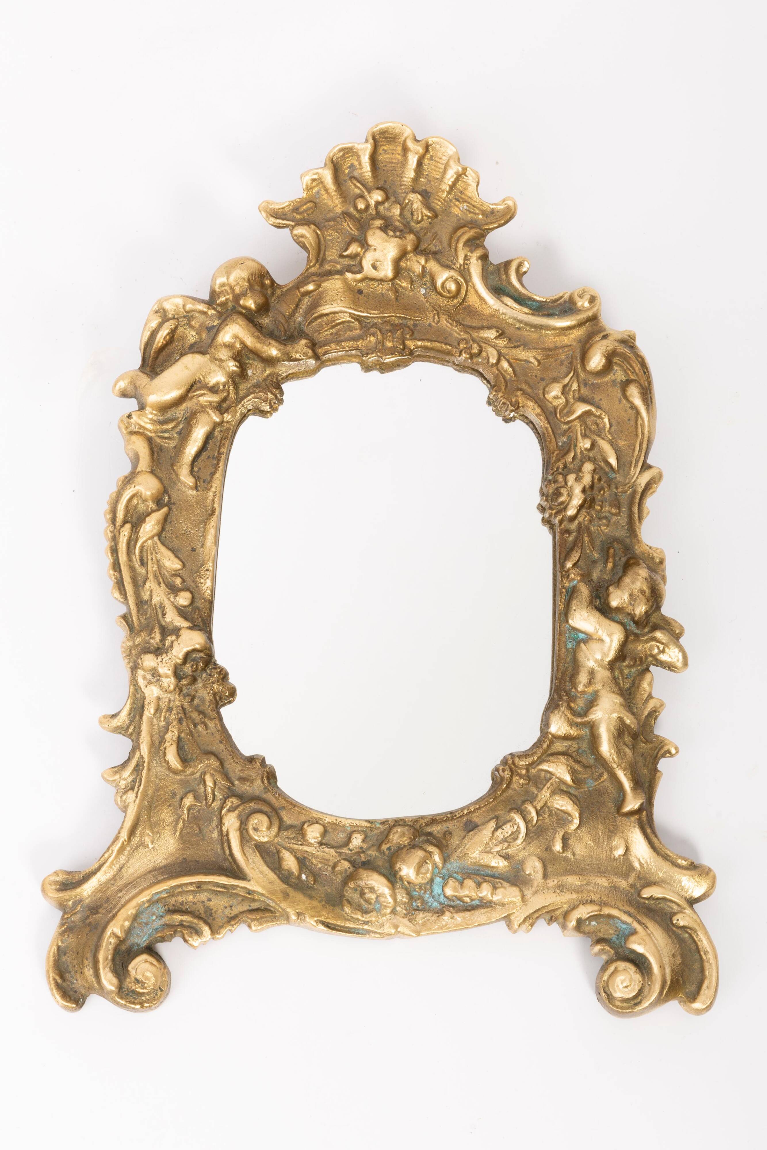 Miniature vintage gold mirror with angels, Italy, 1960s
