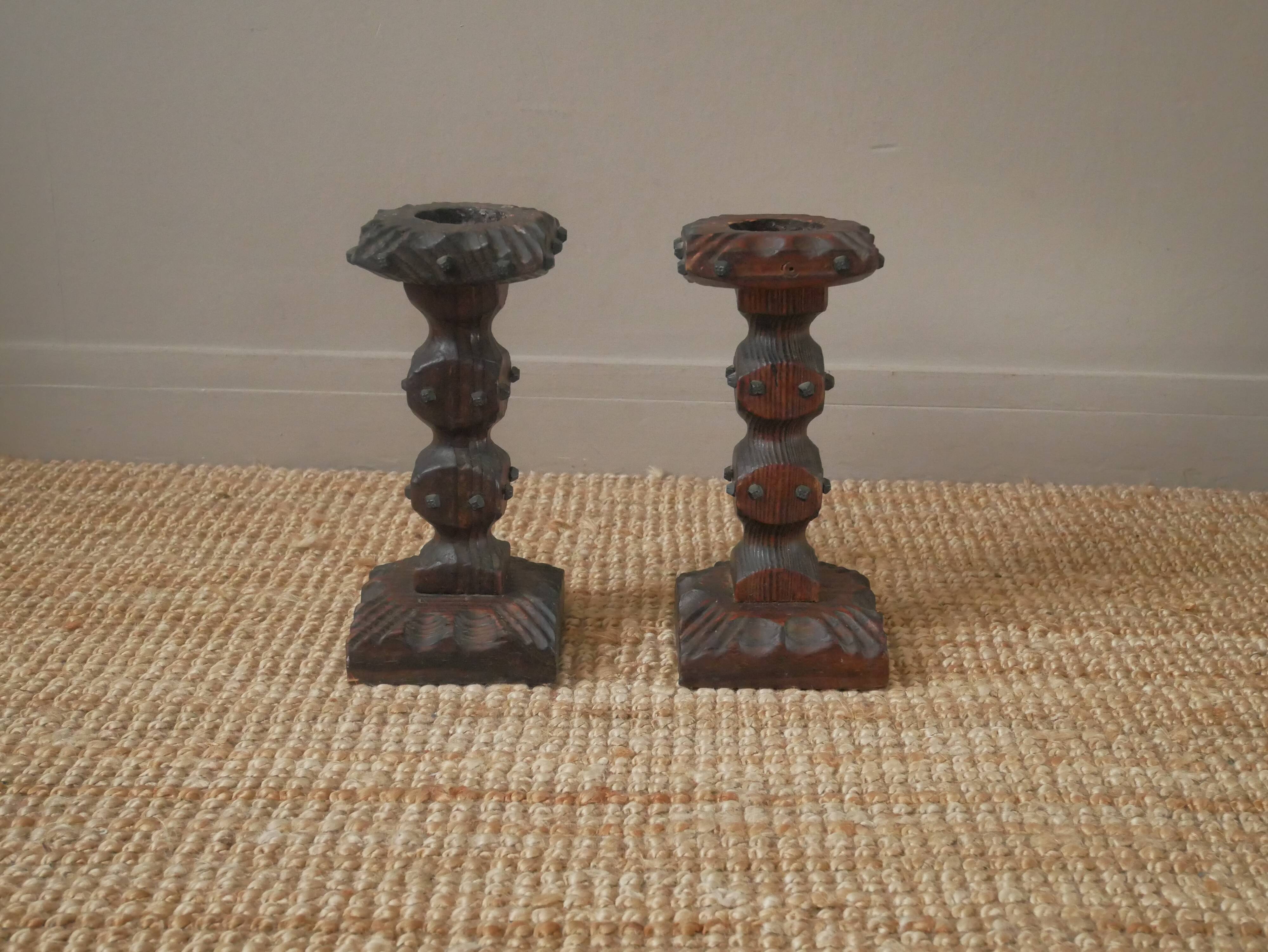 Pair of carved wood candlesticks iron nails handcrafted brutalist design candlesticks