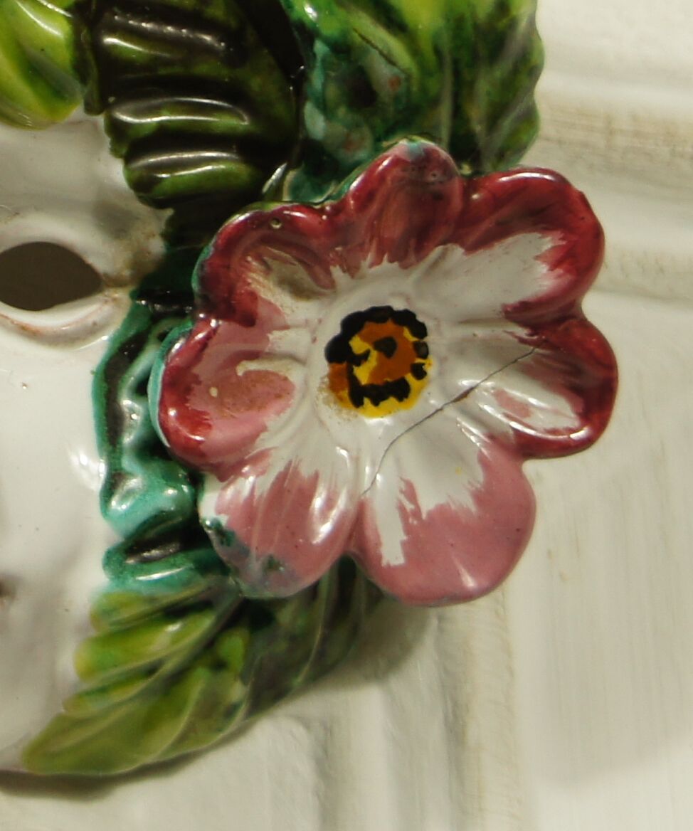 Ceramic mural hoot cherub