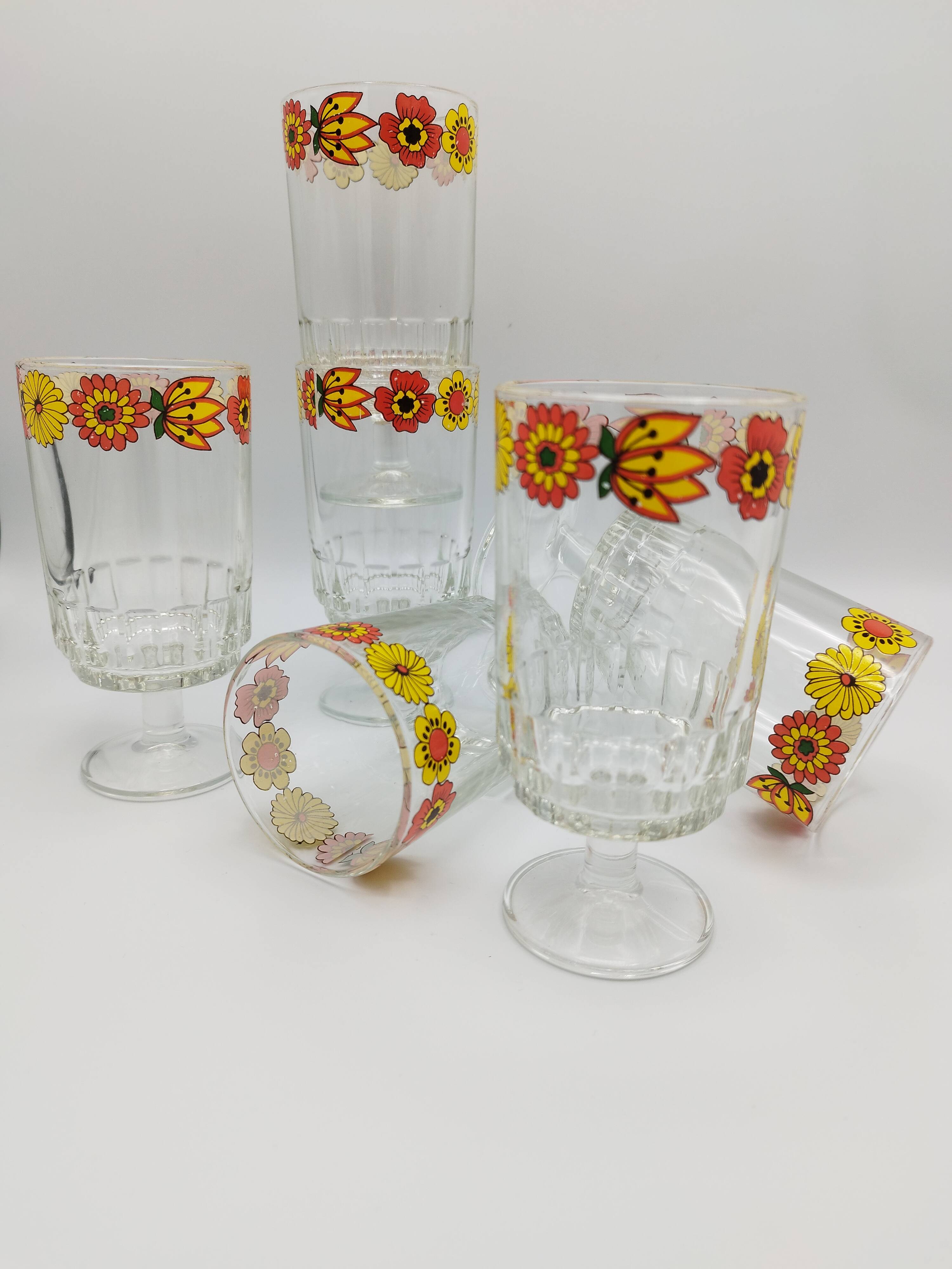 Vintage stemmed glass with floral decoration