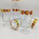 Vintage stemmed glass with floral decoration