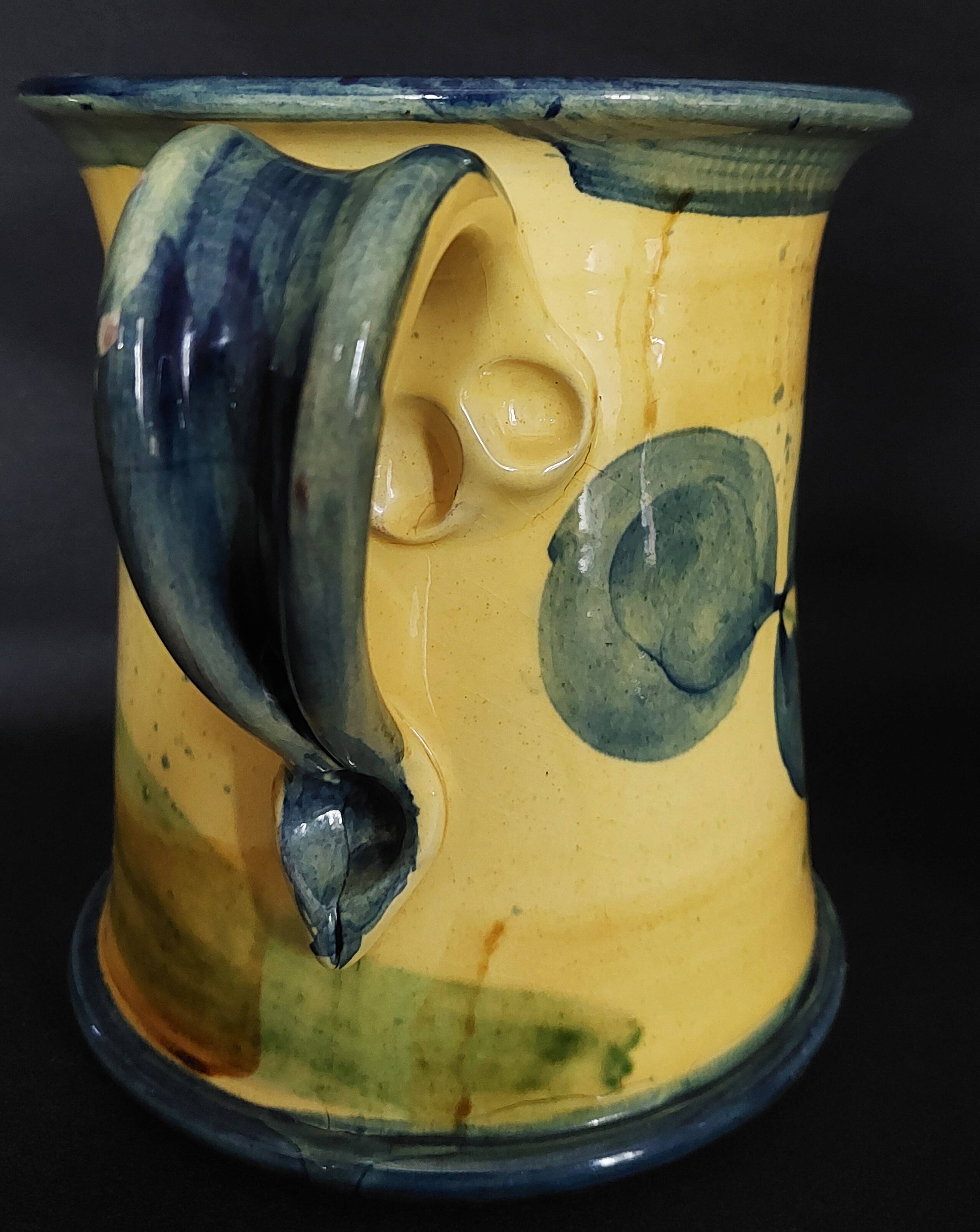 Vintage earthenware pitcher with a glossy finish, signature to be identified, 20th-century ceramics.