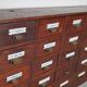 Grand Cabinet d'Apothicaire Antique en Pitch Pine, Belgique, avec Boucliers en Émail, 1900s