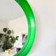 Miroir rond en plastique vert, années 70
