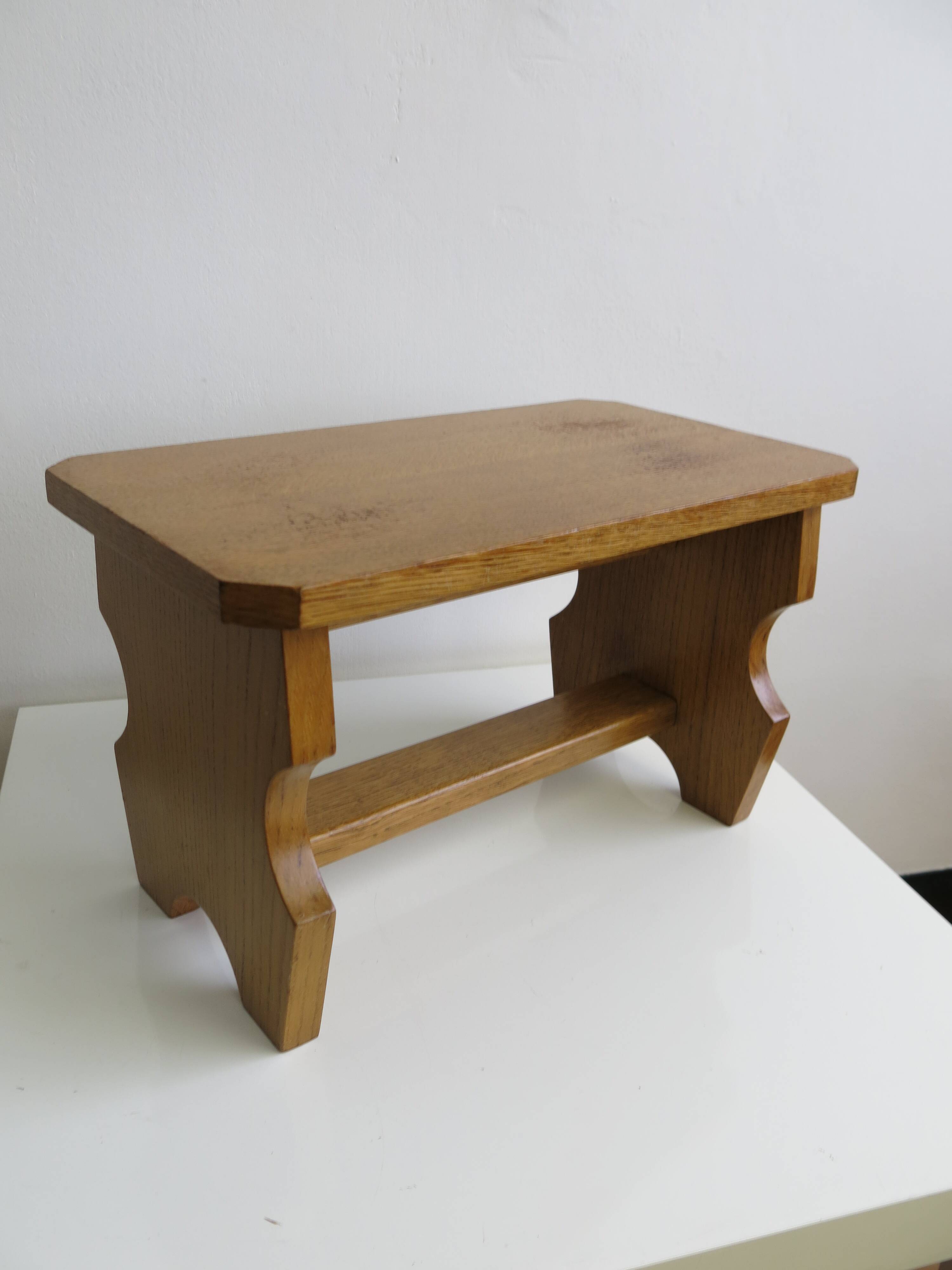 Small wooden footrest stool