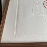 Painted and embossed design, glazed wooden frame
