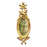 Vintage Empire style wall mirror in gold resin