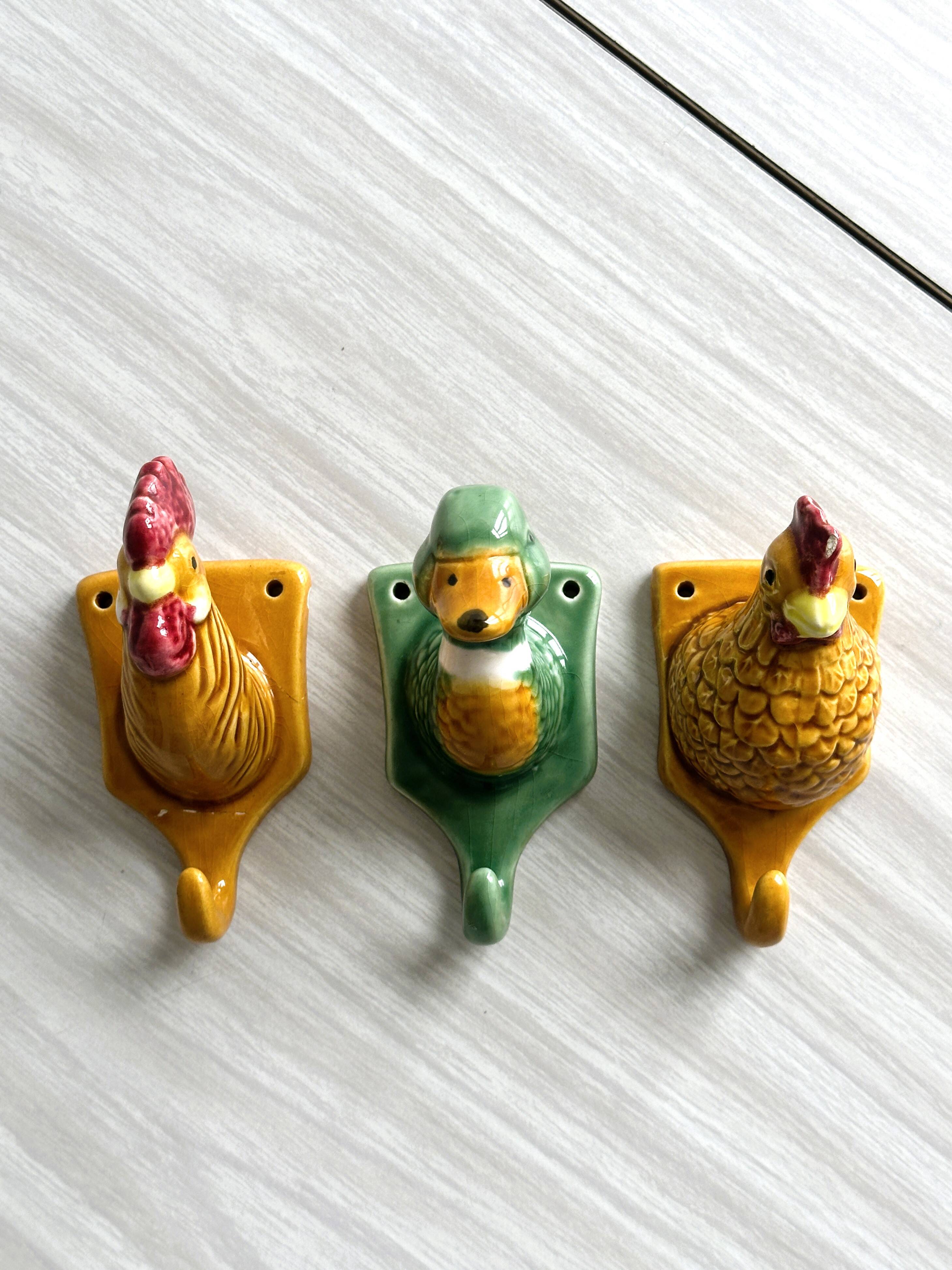 Ceramic slip kitchen towel hooks: Rooster, Hen, Duck.