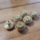 6 Louis XVI polished brass furniture knobs