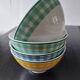 Set of four gingham pattern bowls