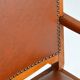 Antique brutalist oak and vinyl armchair