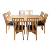 Skovby dining table and 8 vintage Scandinavian style wooden chairs.
