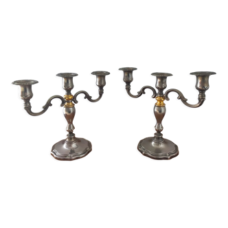 Pair of candlesticks in silver metal