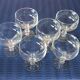6 champagne or cocktail glasses in transparent glass in very good condition.