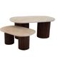 Oval coffee table duo travertine and fluted wooden legs.