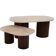 Oval coffee table duo travertine and fluted wooden legs.