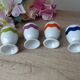 Set of 4 egg cups with spoons, colourful vintage salt and pepper shakers.
