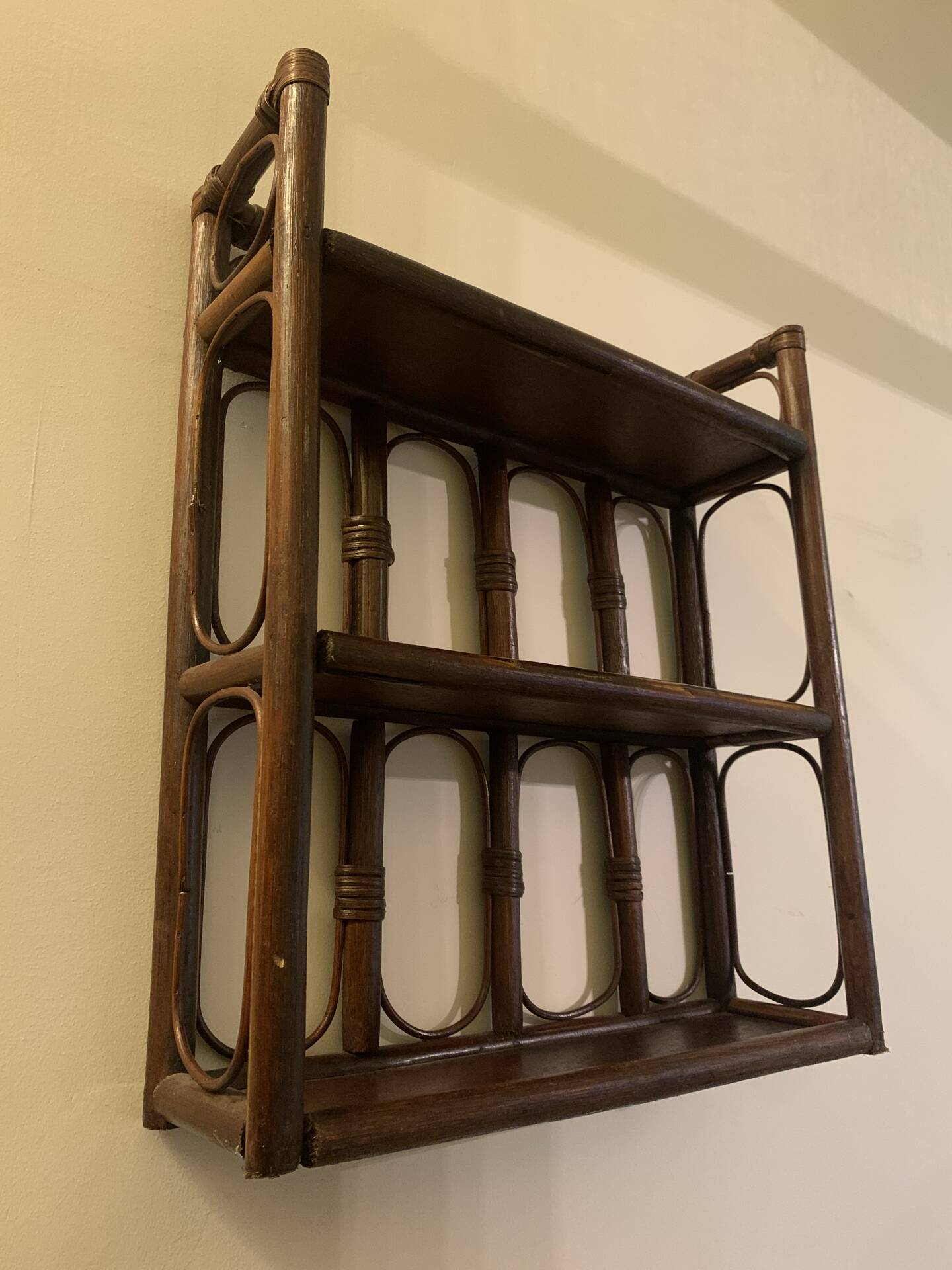 Rattan wall shelf
