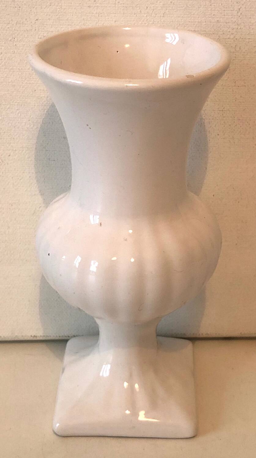 White ceramic medical vase