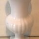White ceramic medical vase