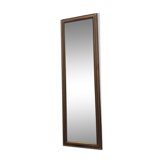 Framed mirror in bronze