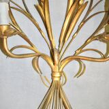 Sconce in golden iron