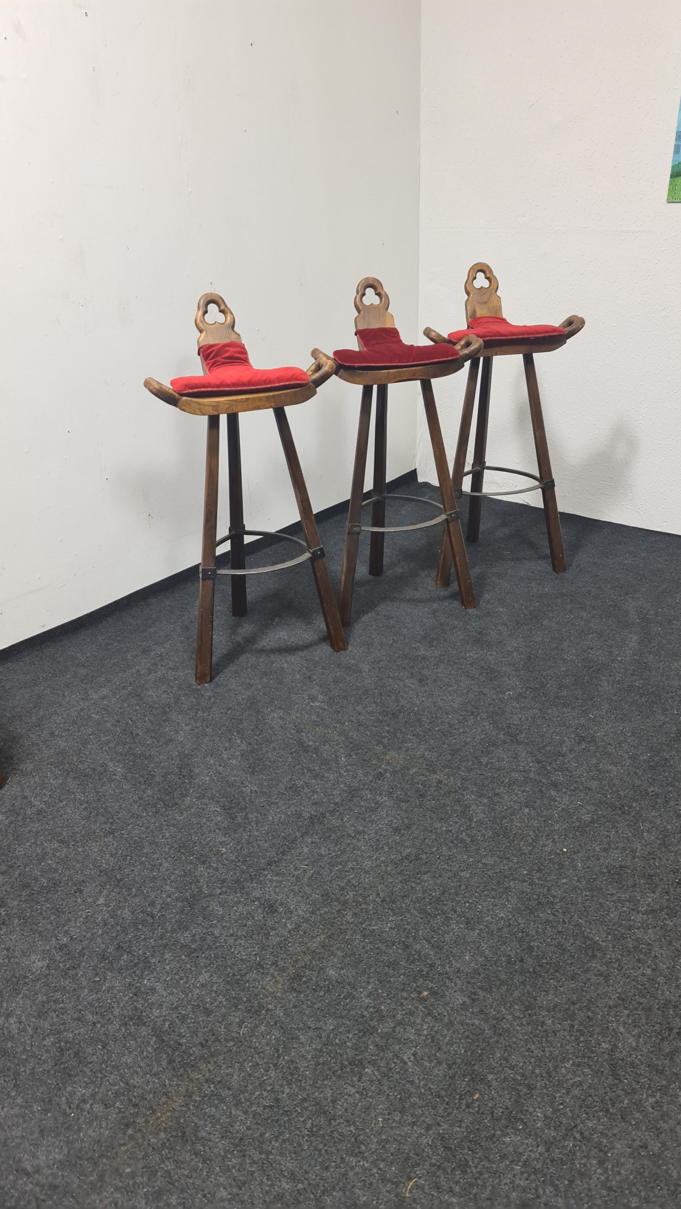 Three vintage Spanish bar stools